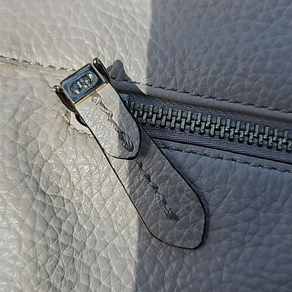 Cole Haan crossbody with fox pom